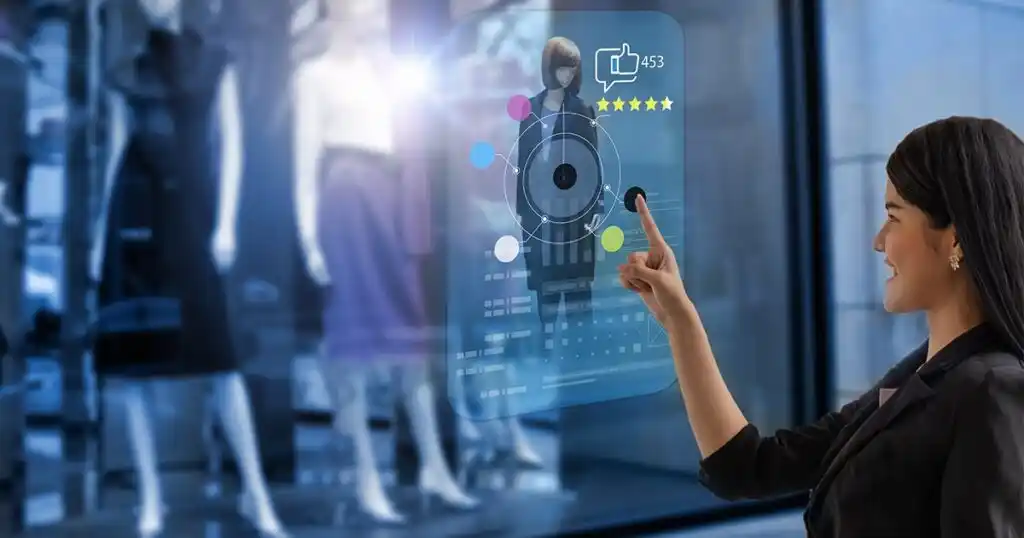 A person interacts with a digital display showcasing clothing and ratings, while mannequins are visible in the background.